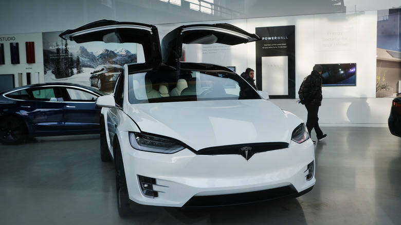 Tesla car with open doors.