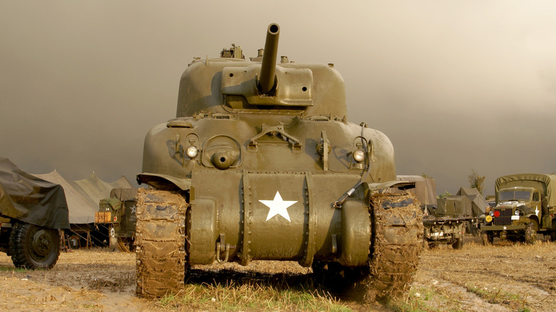 Front view of M4 Sherman tank in rural encampment setting