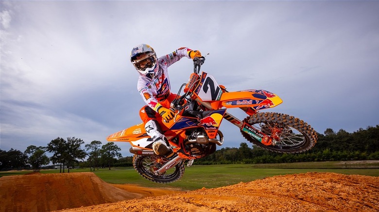 A KTM 450 SX-F Factory Edition in mid-air