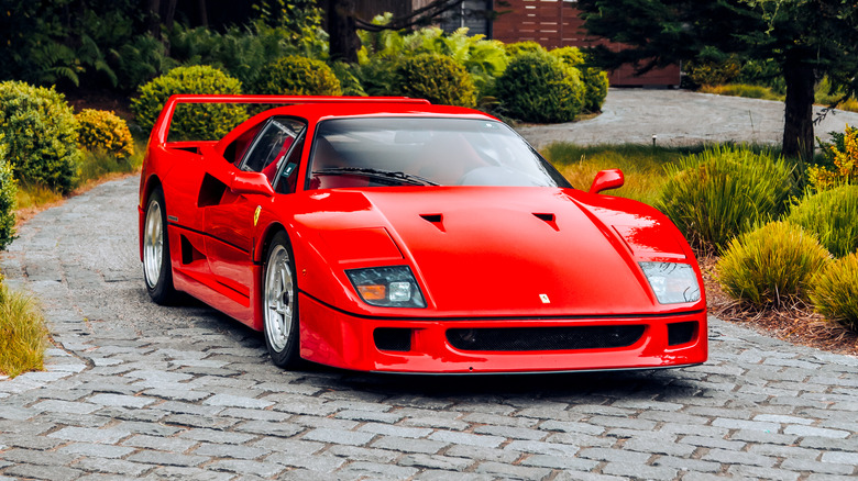 Ferrari F40 on mansion driveway