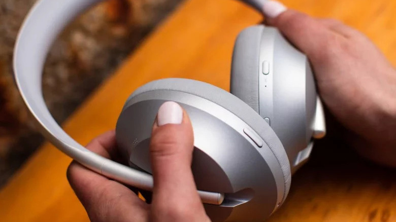 hands holding Bose NC 700