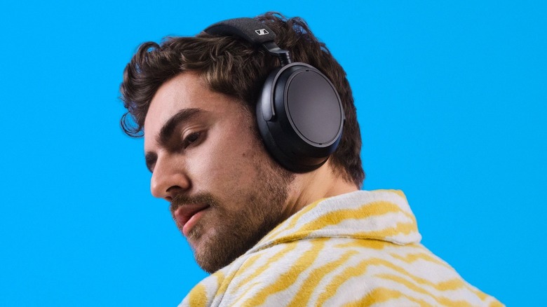 person wearing Sennheiser Momentum 4 Wireless