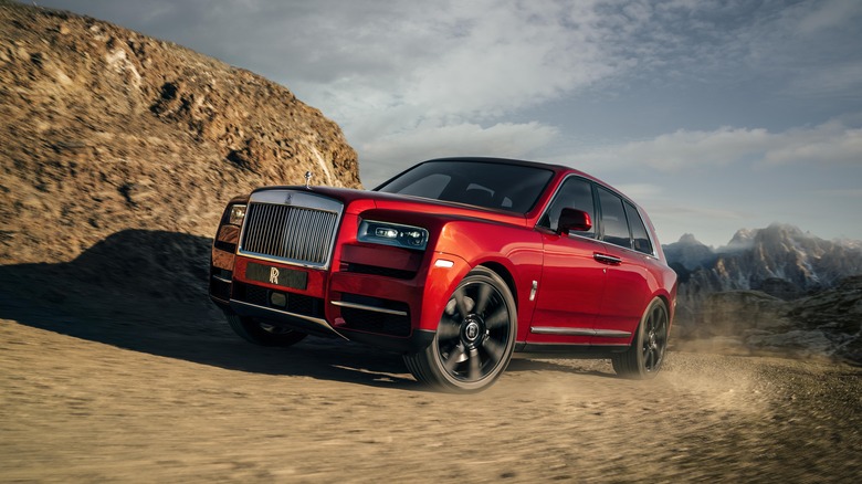 Rolls-Royce Cullinan driving on a dirt road