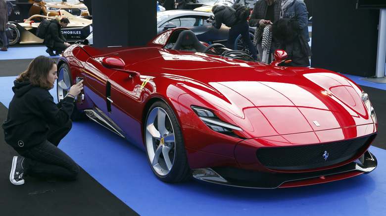 Red Ferrari Monza SP1 at a motor show
