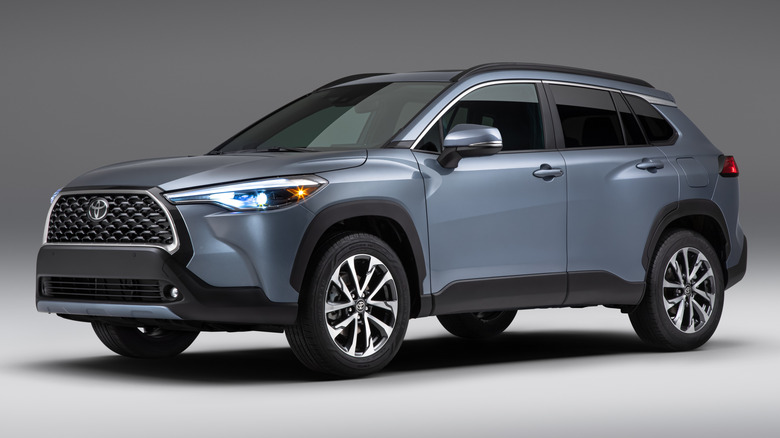 Blue-gray Toyota Corolla Cross studio photo