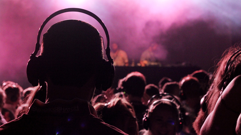 Man wearing headphones silent disco