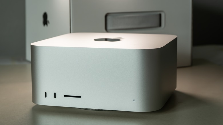 Mac Studio on a desk, with its box at the back