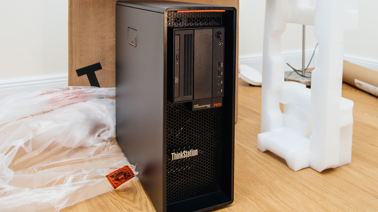 Lenovo ThinkStation P620 freshly unboxed on the floor, next to packaging