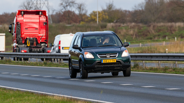 teal Honda CR-V from 2003