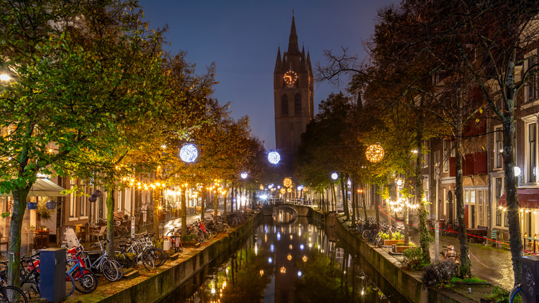 Canal of Dutch city of Delft at night