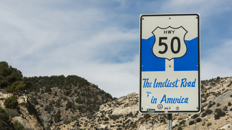 The Loneliest Road in America U.S. Route 50 sign near Nevada desert