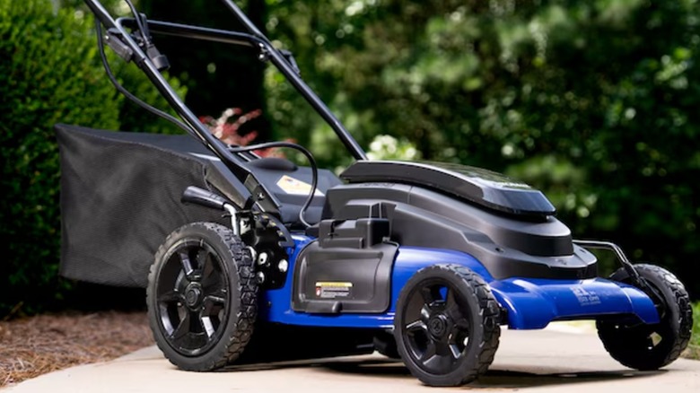 Kobalt mower on sidewalk