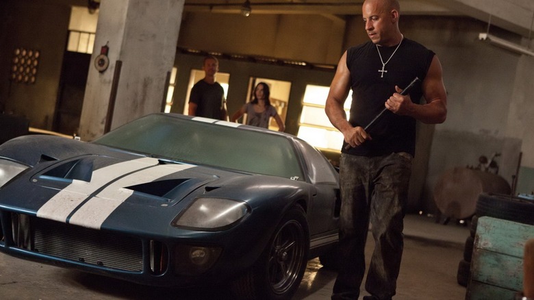 Dom walking by a 1965 Fort GT40 (Replica) in "Fast Five"