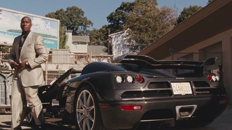 Tej exiting a 2010 Koenigsegg CCXR in "Fast Five"
