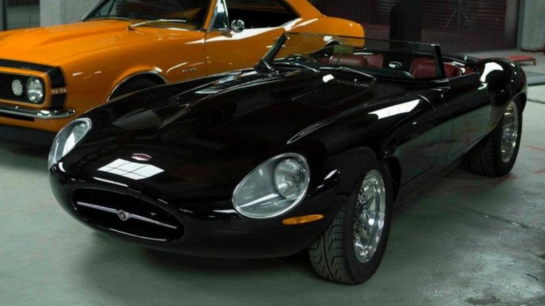 A garage featuring multiple cars, including an Eagle Speedster in "Fast & Furious 6"