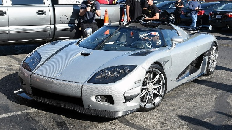 Floyd Mayweather driving exotic car
