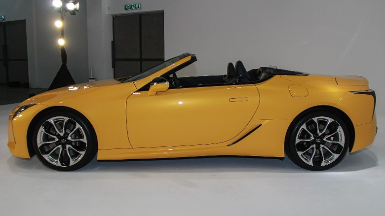 Yellow Lexus LC 500 Convertible in a garage