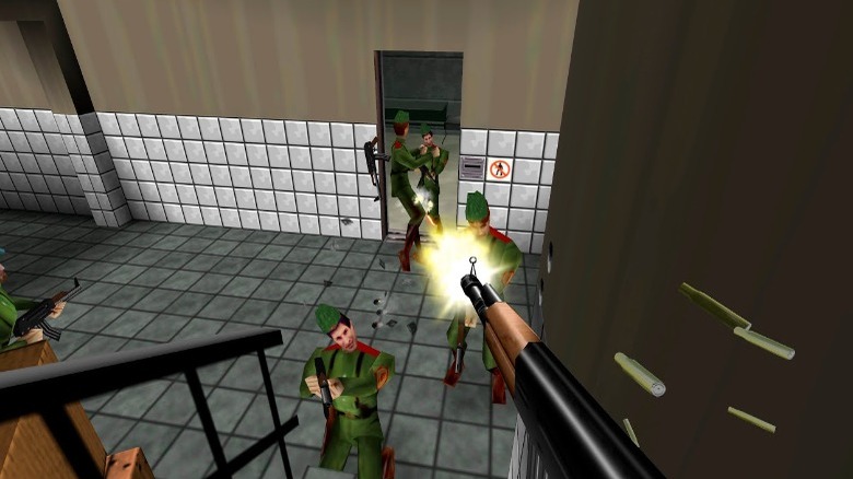 Bond shooting enemies in GoldenEye 007
