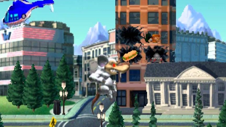 A giant mouse attacking a building