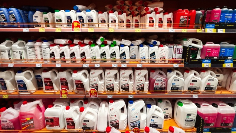 bottles of coolant on a shelf