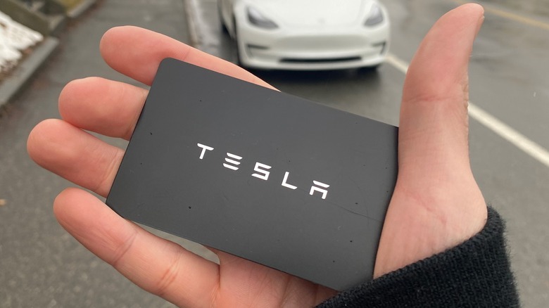 keyless tesla card in hand