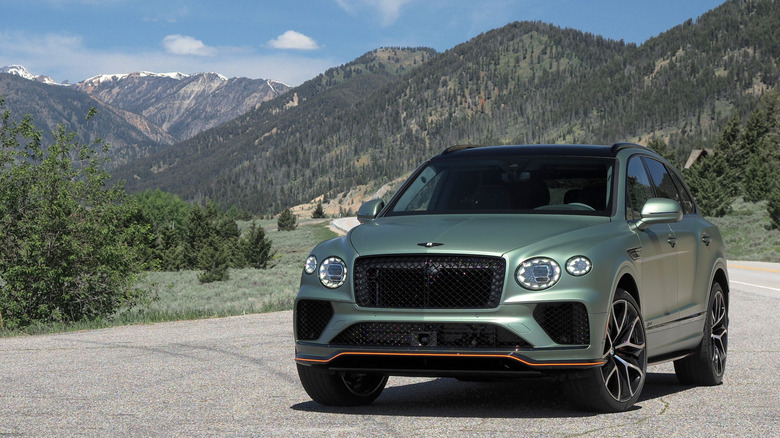 2026 Bentayga Speed front view in front of curling road
