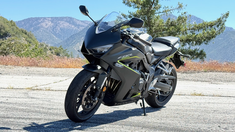 2026 Honda CBR650R parked in front of trees and mountains