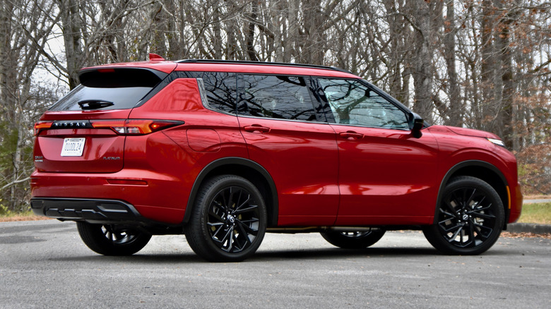 2026 Nissan Rogue Plug-In Hybrid rear three quarter view.
