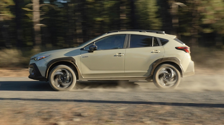 2026 Subaru Crosstrek Hybrid blasting down a dirt road