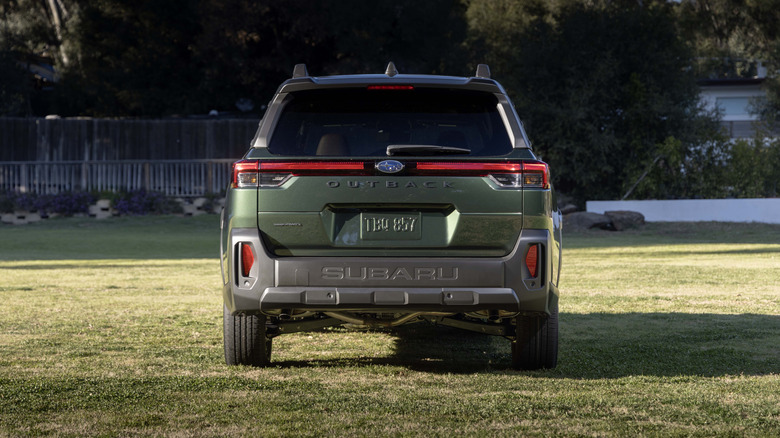 A 2026 Subaru Outback in green, rear view