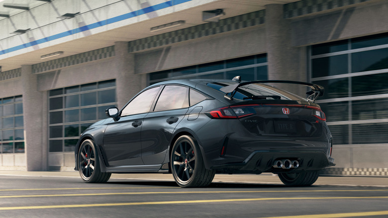 Rear view of black 2027 Honda Civic Type R on track