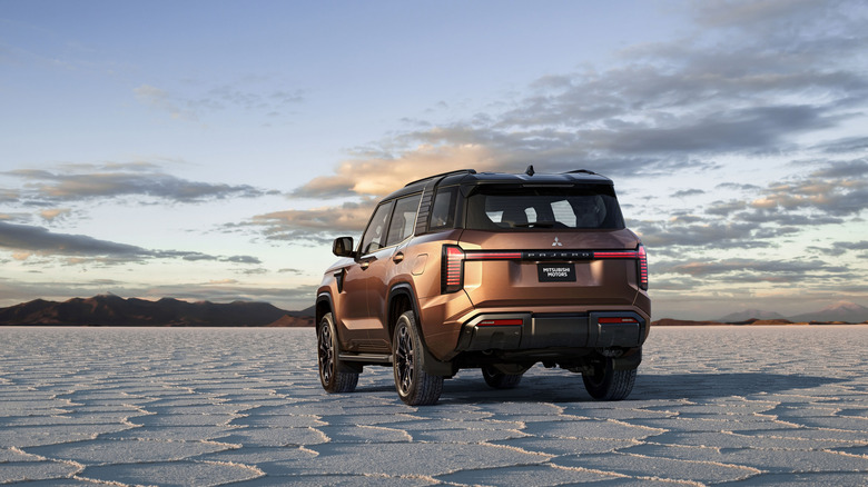 Rear view of 2027 Mitsubishi Pajero paked on salt flats