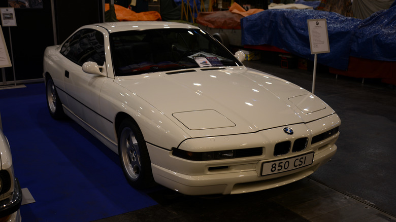 A white BMW 850CSi on display
