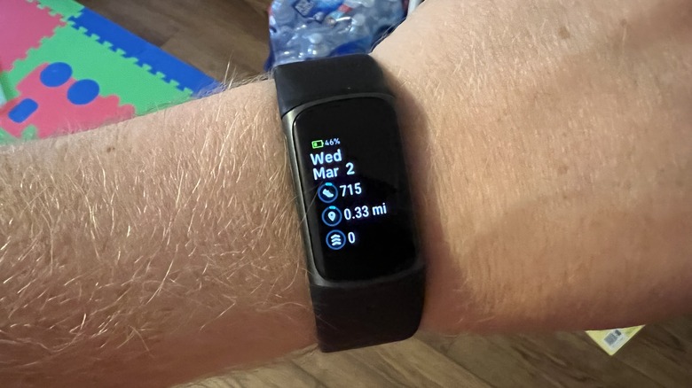 Person wearing Fitbit Charge 5