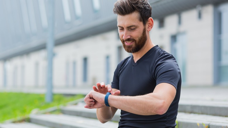 Person using fitness tracker