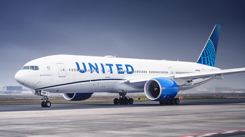 United Boeing 777 plane parked tarmac