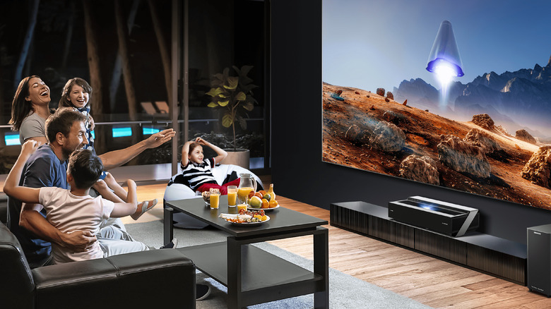 Family watching Hisense Laser TV