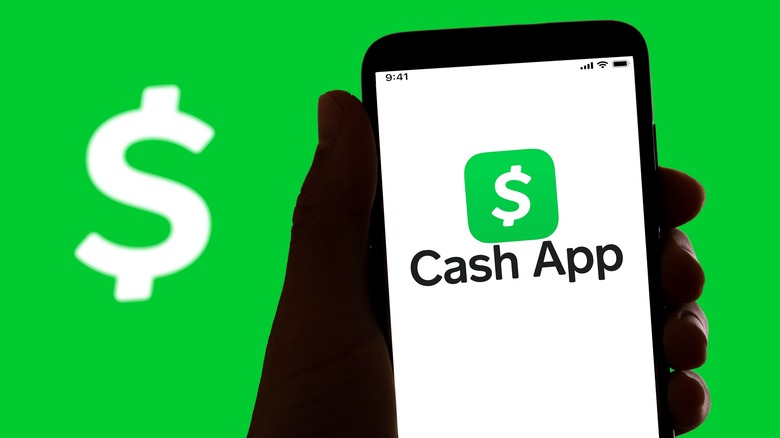 Cash App logo on phone and in background