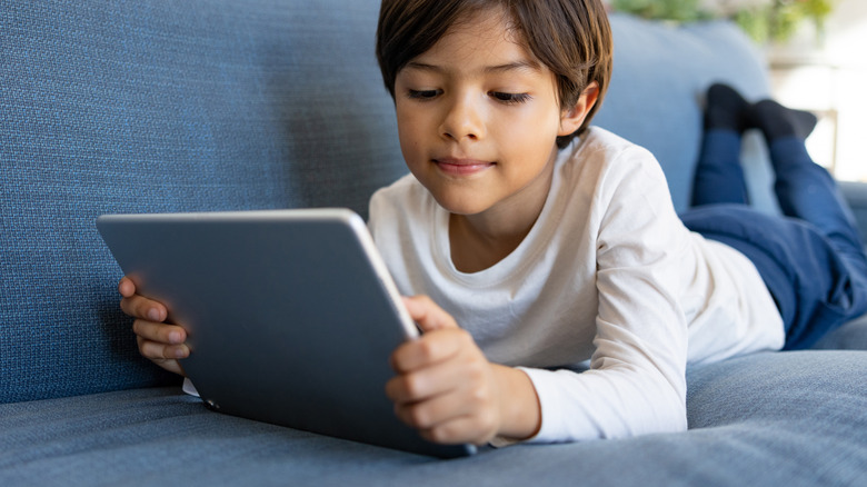 boy using tablet