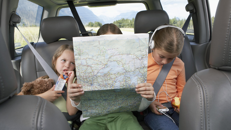 children looking at map