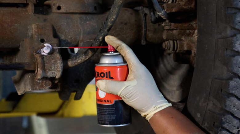 Kroil being applied to vehicle part