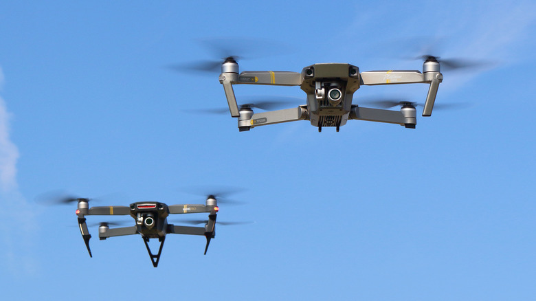 drone flying behind another drone