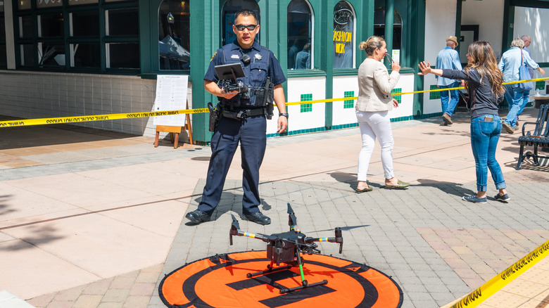 Law enforcement officer with drone