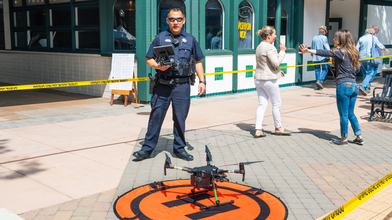 Law enforcement officer with drone