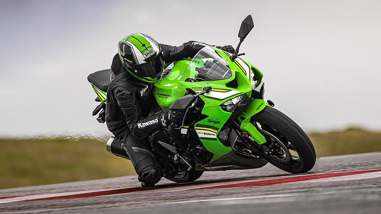 Kawasaki ZX-6R cornering on a racetrack