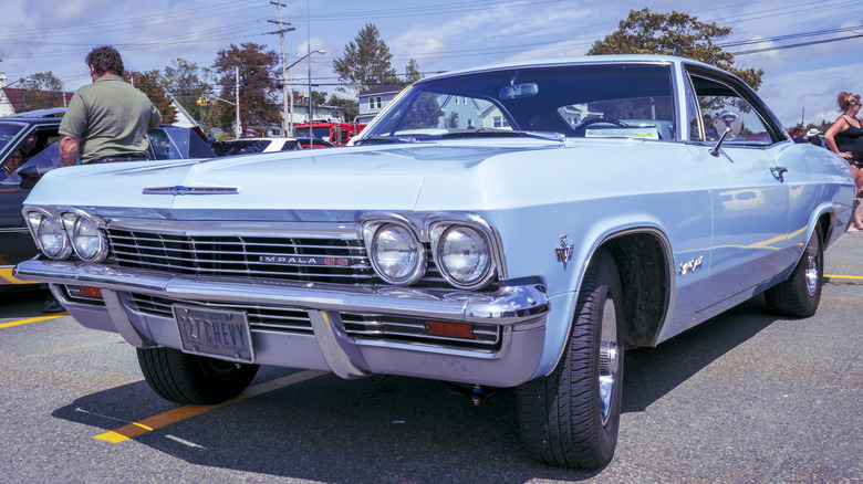 1960s Chevy Impala in parking lot