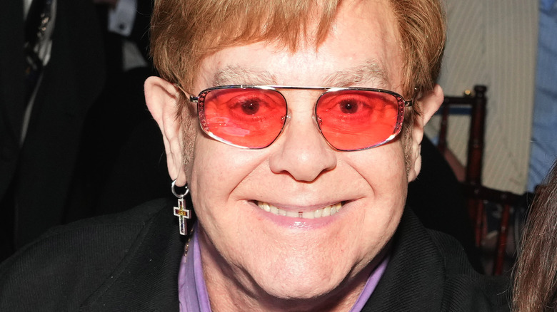 Elton John smiling sunglasses