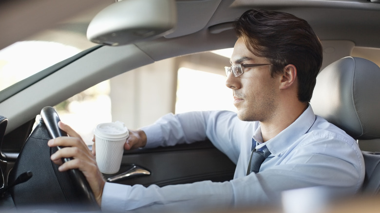 businessman driving to work