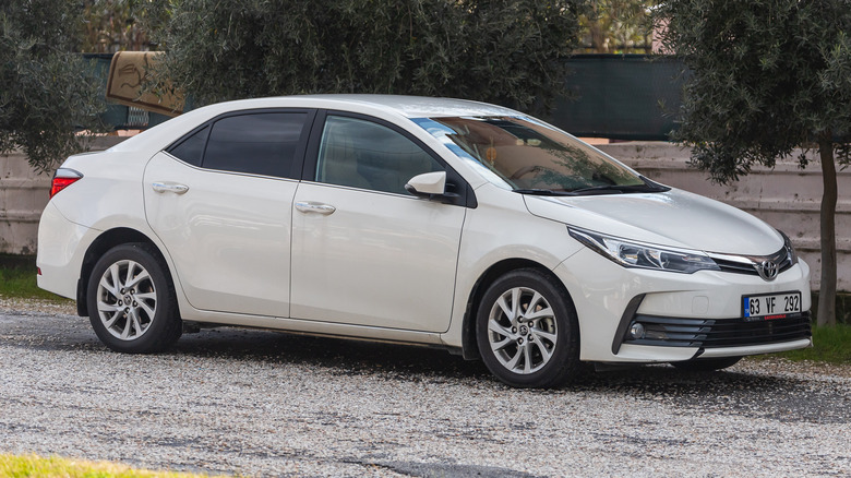 white toyota corolla