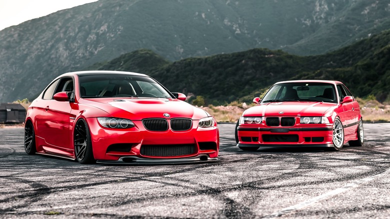 two red BMWs